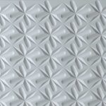 Detailafbeelding van een witte 3D structuur, met origami effect, uit de patternine collectie van Durasein, welke een driedimensionaal effect creëren